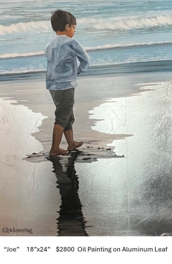 "Joe" a boy walking on the beach.
